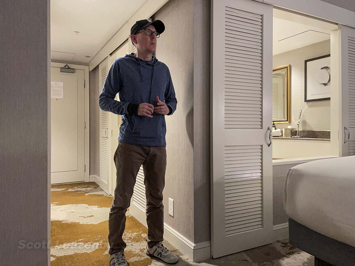 Scott standing in his room at the Fairmont Hotel YVR