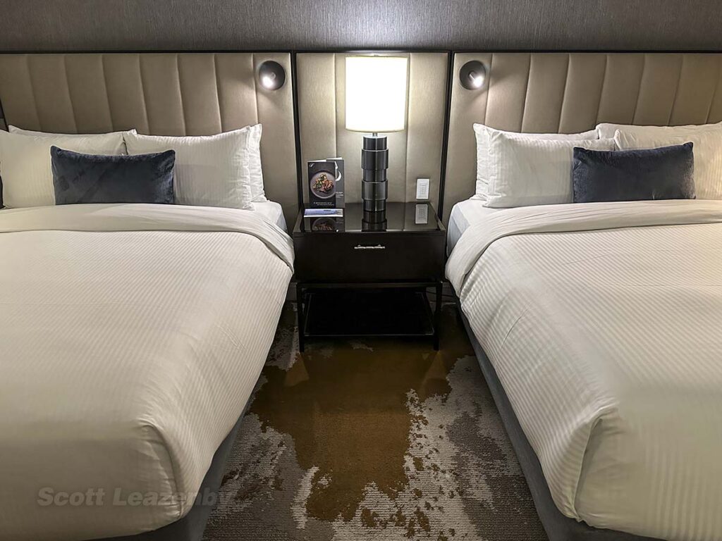 Twin beds and nightstand Fairmont Hotel YVR