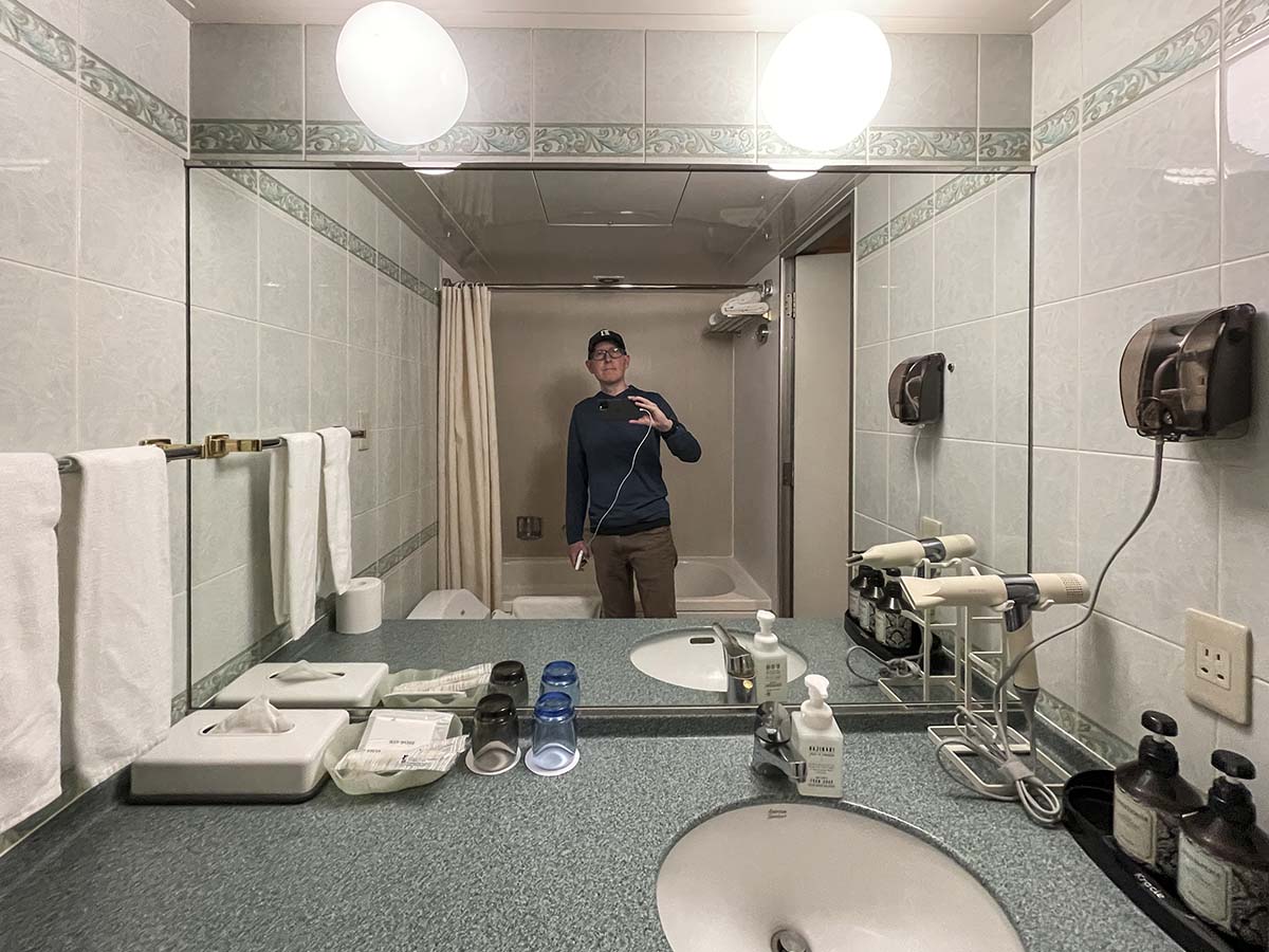 Bathroom vanity and mirror in my room at the Garden Hotel Narita