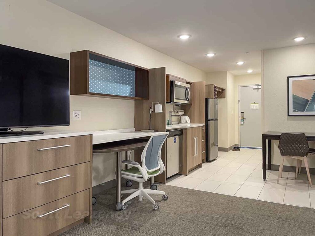 Home2 Suites Grand Blanc standing in room looking towards entrance door