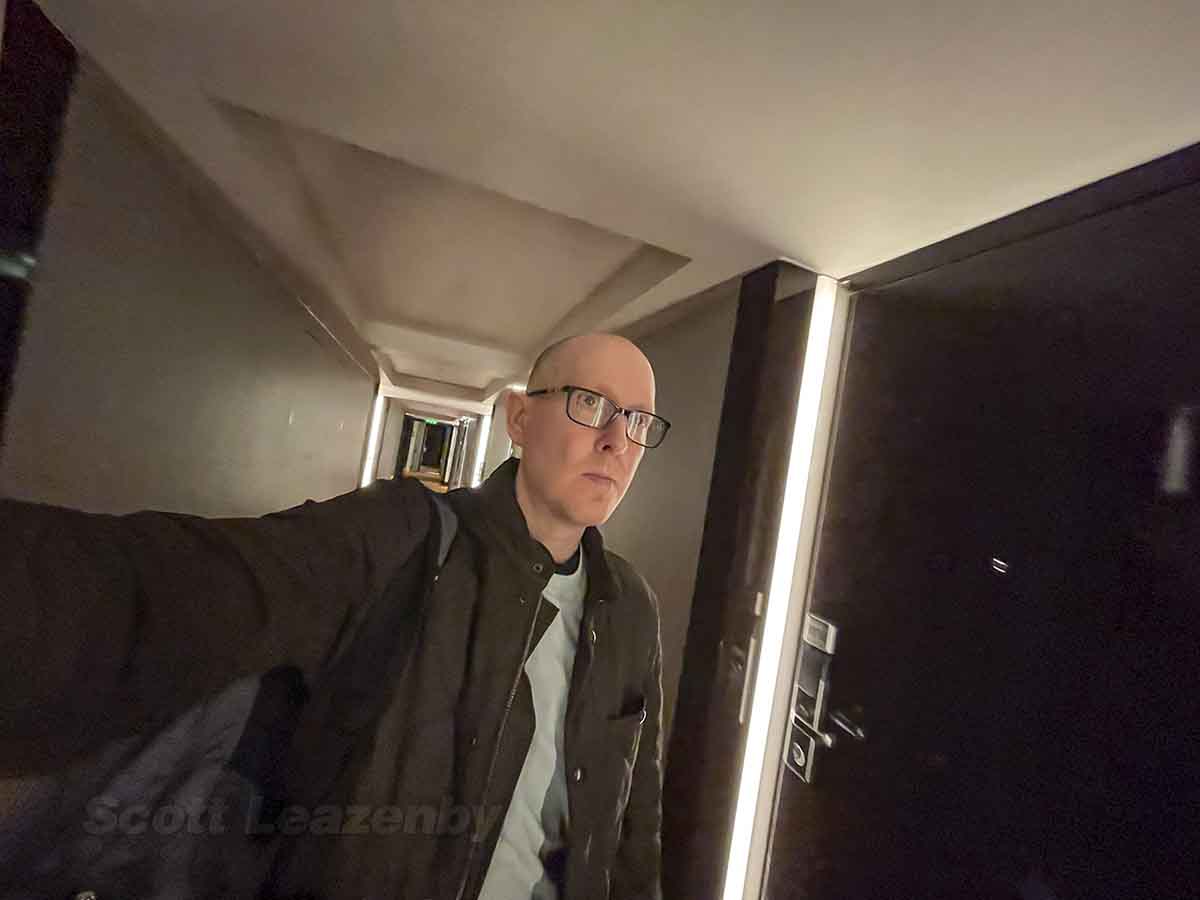 Scott Leazenby walking through the park plaza Westminster Hotel in London