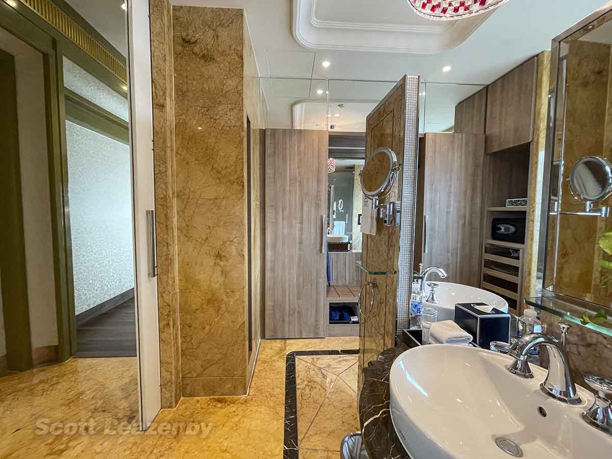 The Reverie Saigon Hotel panoramic room closet space in the bathroom