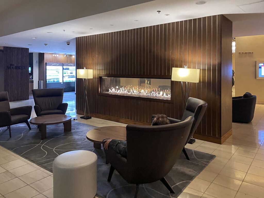 Marriott Newark Airport lobby lounge area with fireplace