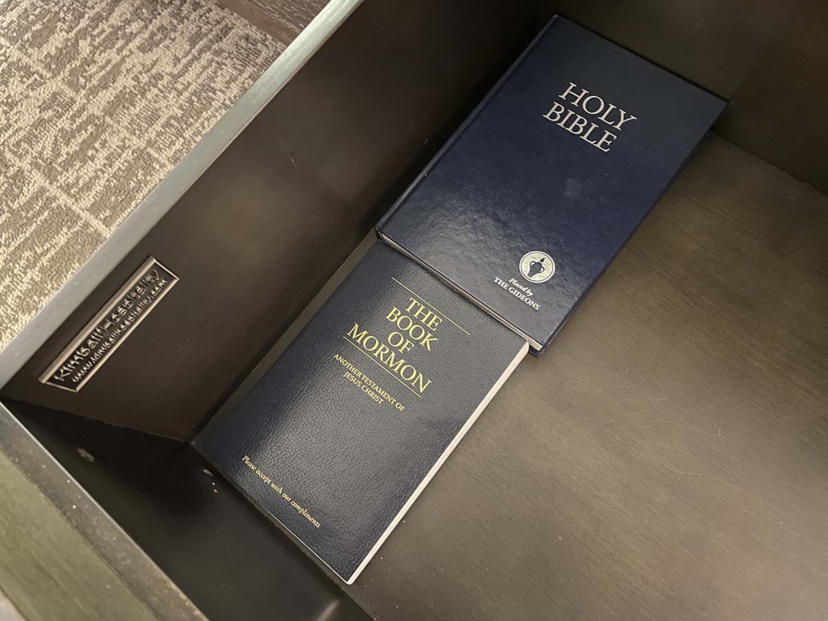 Holy Bible in the book of Mormon in my room at the Marriott Newark Airport 
