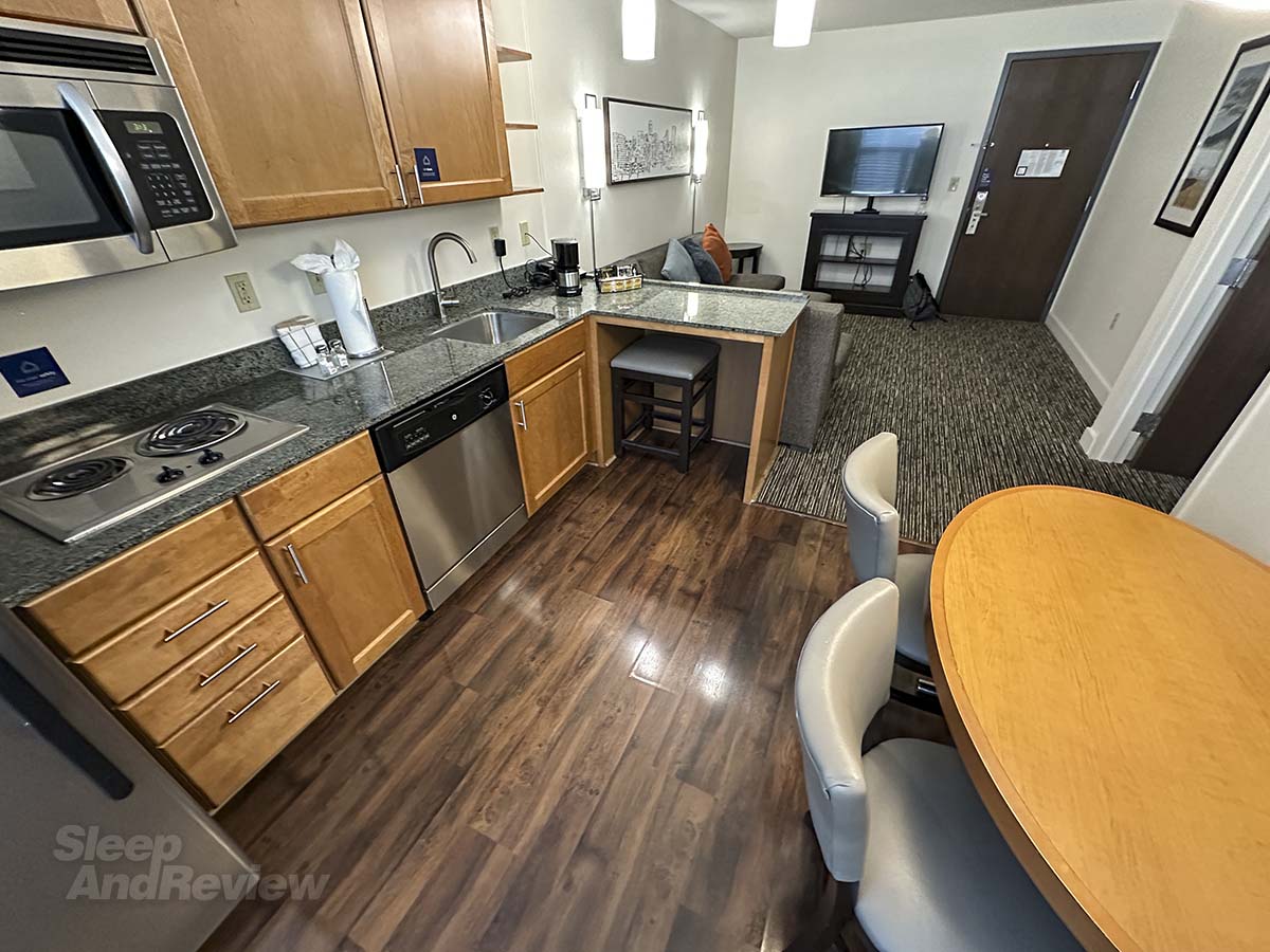 Kitchen and living room in my room at the Hyatt House Denver Airport