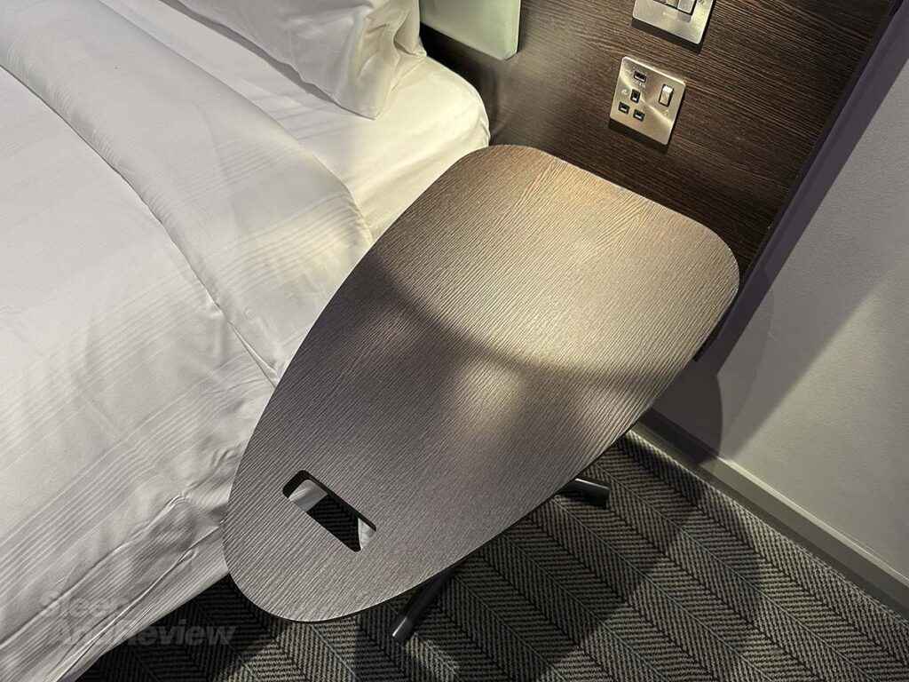 Bedside table in my Premier Plus room in the Premier Inn London County Hall Hotel