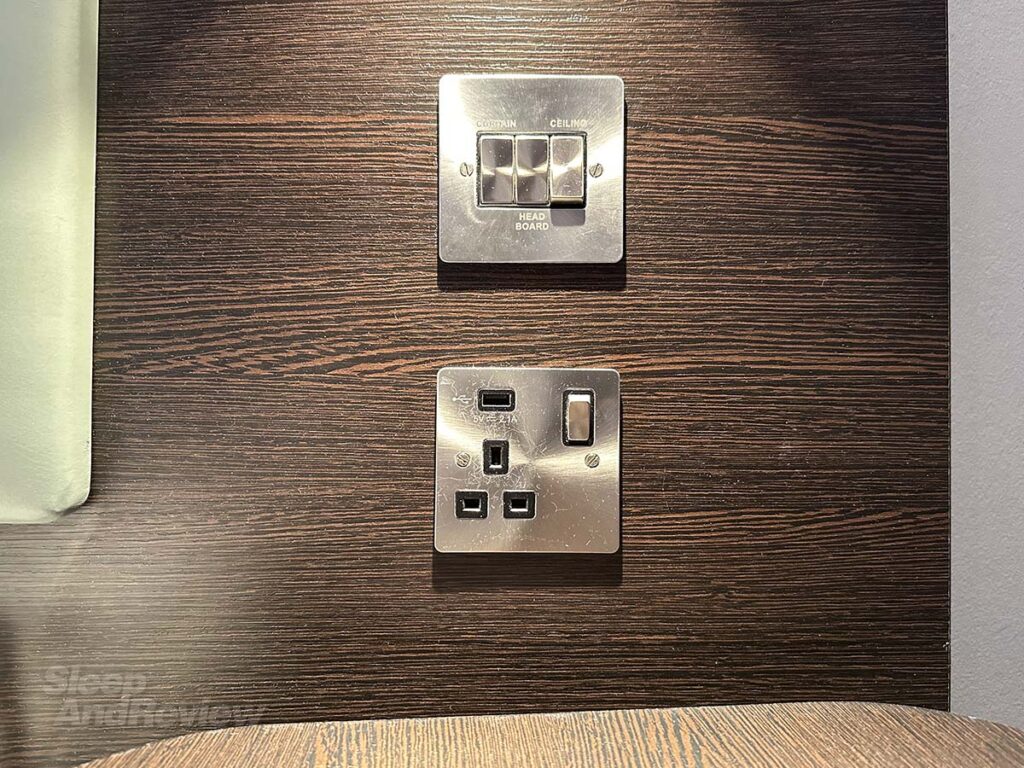 Light switches and electrical outlets in my Premier Plus room in the Premier Inn London County Hall Hotel