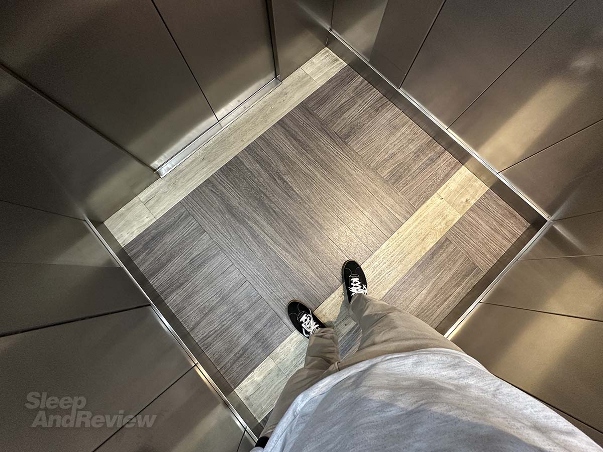 Riding the elevator up to my room in the Premier Inn London County Hall Hotel