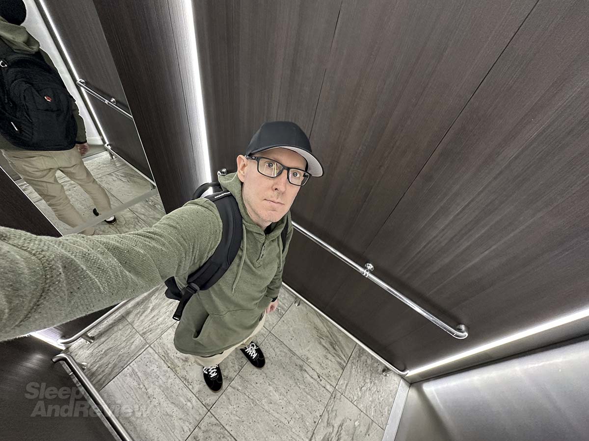 Scott Leazenby in the elevator in the Hilton Garden Inn Terminal 2 Heathrow Airport