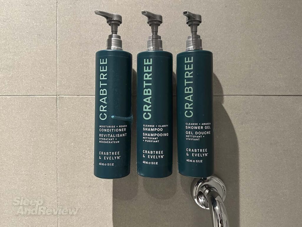 Crabtree shampoos and shower gels in the bathroom in my room at the Hilton Garden Inn Heathrow Airport