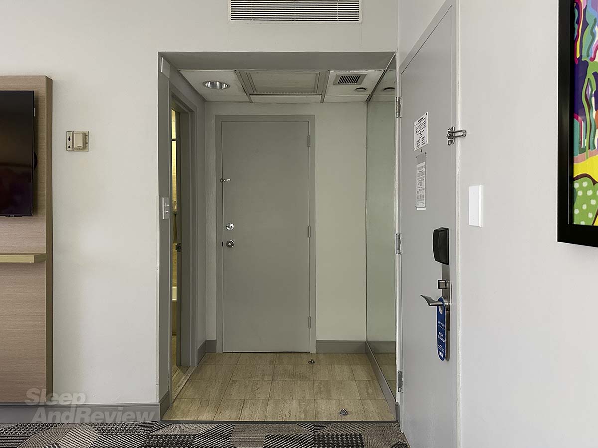 Door leading to storage closet or utility room in my room at the Miami International Airport hotel