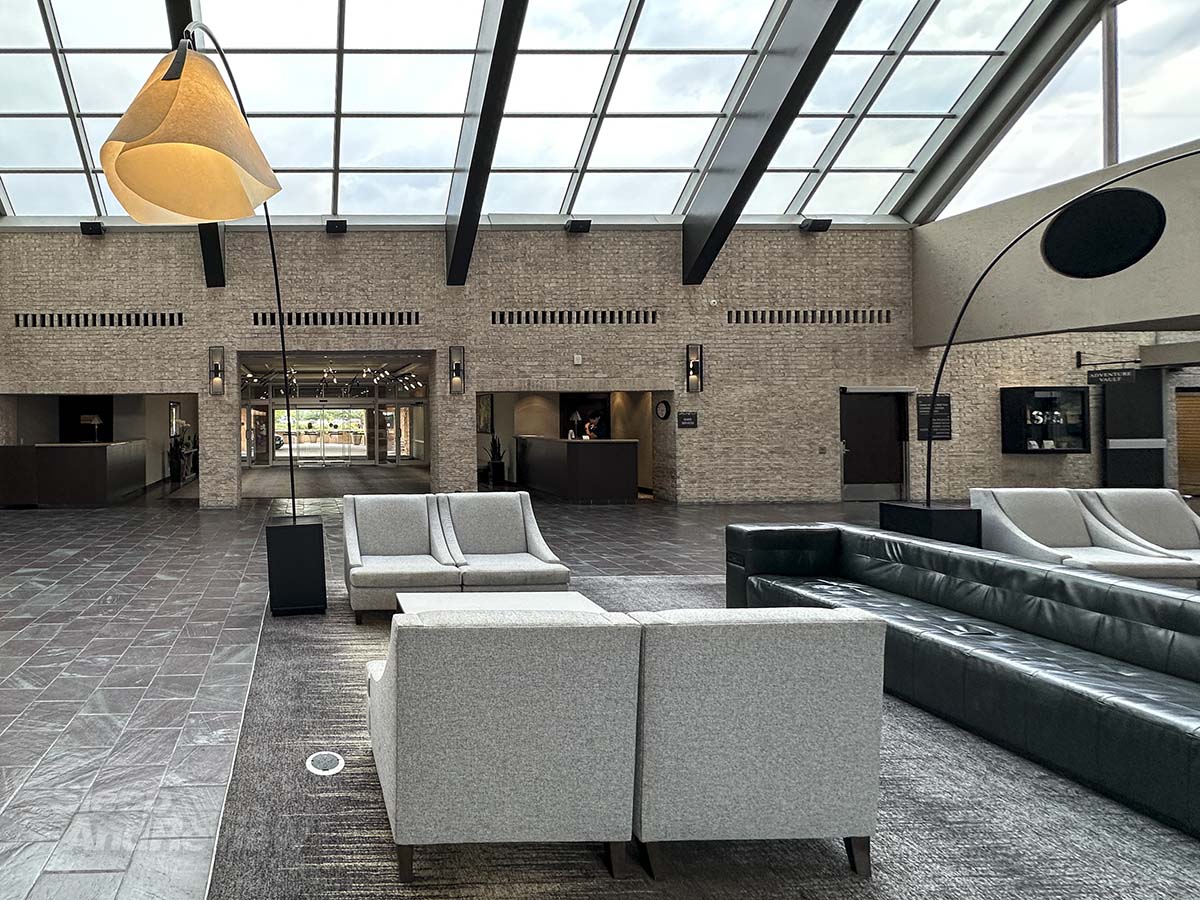 The Inverness Denver Hotel lobby with lounge seating