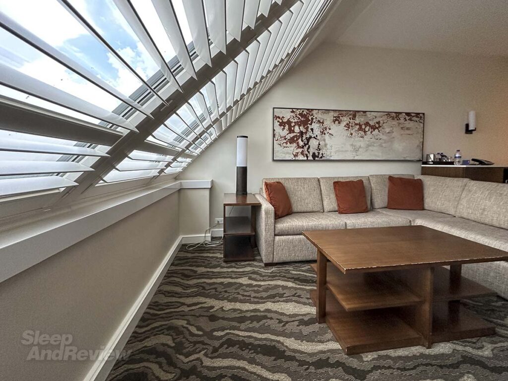 Furniture in the living room of my studio suite at the Inverness Denver Hotel