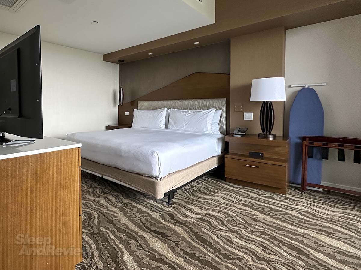 The bedroom with King bed in my Studio suite at the Inverness Denver Hotel