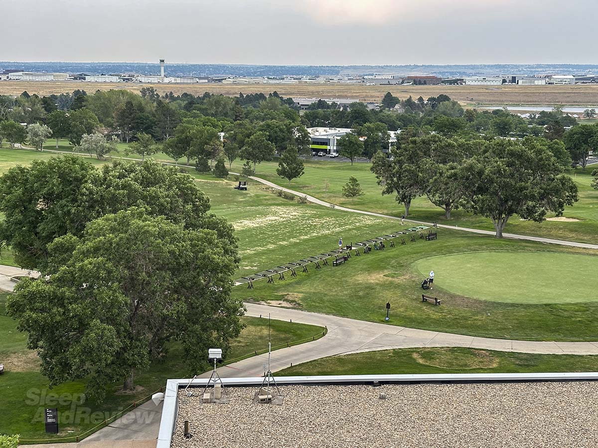 View of the golf course, driving range, and putting green from my fifth floor studio suite at the Inverness Denver hotel