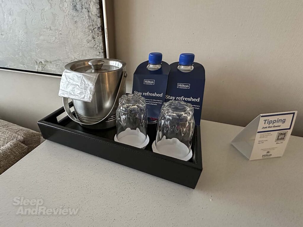 Two complementary bottles of water in my room at the Inverness Denver Hotel