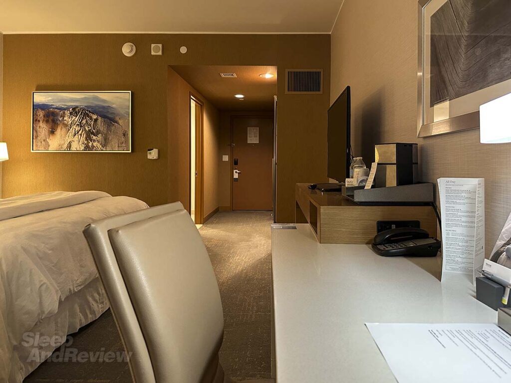 Desk and chair in my room at the West in Denver airport