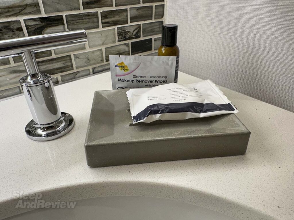 Complementary soaps and lotions next to the sink in the bathroom in my room at the Westin Denver Airport