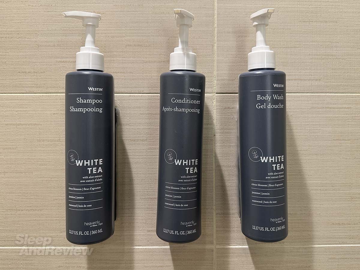 Shampoo, conditioner, and body wash in the shower in my room at the Westin Denver airport