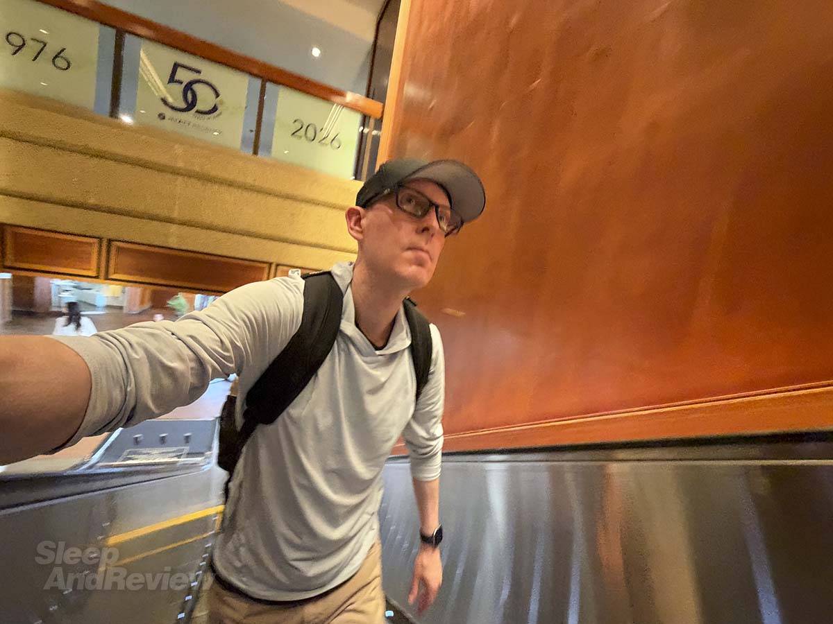 Scott Leazenby walking into the Hyatt Regency Waikiki Resort and Spa
