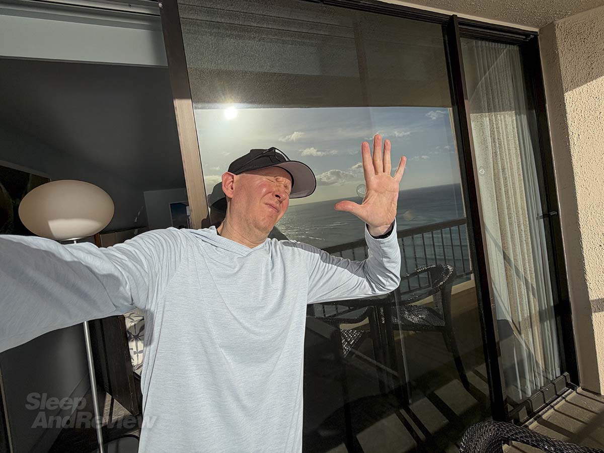 Scott Leazenby being blinded from the sun from the balcony of his 30th floor room at the Hyatt Regency Waikiki Resort and Spa